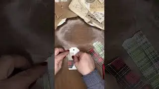 simple collaged tag with Christmas backdrops by Tim Holtz