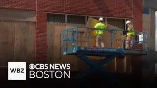 Many windows still boarded up at English High School in Jamaica Plain as school begins