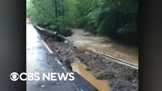 Deadly flash flooding hits the Northeast as record-breaking heat cooks the South