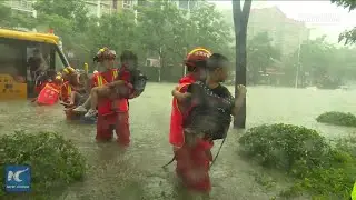 22 children rescued from school bus stuck in floodwaters in China