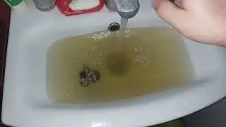 Tea whirlpool in the sink 1