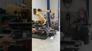 Robot FANUC R2000IB 165F R30IA controller on track at UsedRobotsTrade