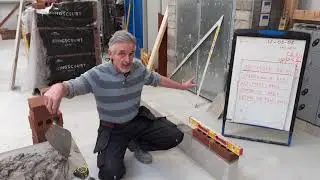 Laying the first course of bricks