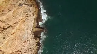Drone View of Cliff and Sea [Royalty Free Video]