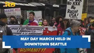 People push for the rights of immigrants and workers during May Day march