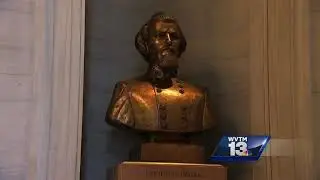 Latest: NC protesters pull down Confederate statue
