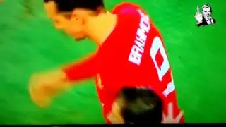 Zlatan Ibrahimovic moving the referees arm off him