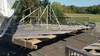 Removing the deck on a flat roof with my crane