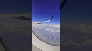 Head in the clouds #sky #flight #shorts #viralvideo #travel #clouds #mountains #nature #ytshorts #yt