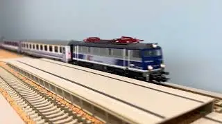 PIKO EP08-009 with a rake of ACME PKP coaches on my slowly developing layout