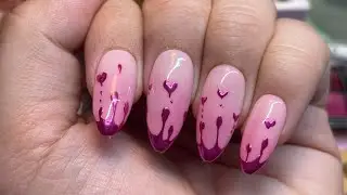Drippy chrome Heart valentines nails 