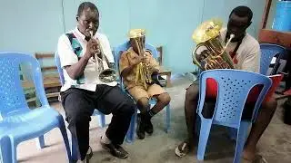 ADRIAN NZIOKA ON THE Eb TENOR HORN. GRADE 3 AT ST JOSEPH TUDOR-CRIMOND