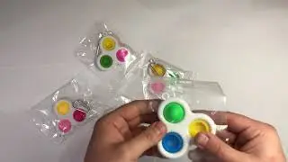 Видео обзор: Сенсорная игрушка Simple Dimple (симпл димпл) поп ит антистресс pop it. Тройной
