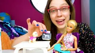Barbie-nukke & lelukoira el&auml;inl&auml;&auml;k&auml;riss&auml;. Nuket ja lelut.