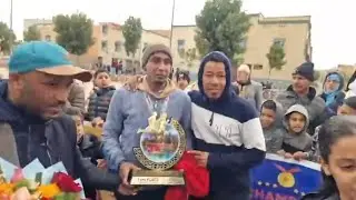 استقبال البطل المغربي عبد الهادي لباعلي الفائز  بماراثون مراكش الدولي  2026، بمدينة أيت ايعزة
