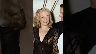 Marilyn Monroe backstage with Fox employees at the Fox Studio Club Little Theatre on March 19, 1948.
