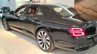 [8k] Midnight Emerald Bentley Flying Spur W12 at Bentley Stockholm. Brutal!