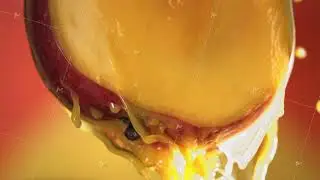 Flowing Mango Juice from half slide Mango , macro shot in slow motion