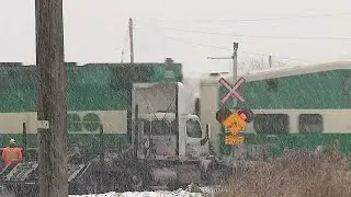 Transport truck collides with GO train