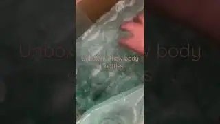 ASMR unboxing of our new body oil bottles
