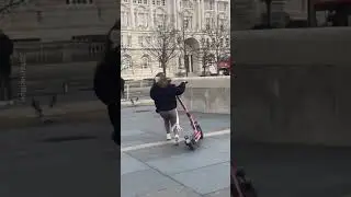 Girl Falls Off Electric Scooter 🤣
