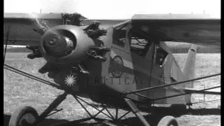 A pilot in cockpit  of Potez 25 biplane in Ethiopia. Scenes of  Breda Ba.15 aircr...HD Stock Footage