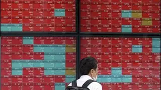 Japan's Nikkei falls through key 31,000 line on Middle East concerns