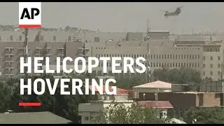 Gunfire rattling, helicopters hovering, smoke in Kabul