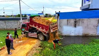 work landfill full project ! team truck unloading with bulldozer komatsu d20p push soil
