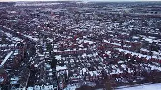 4K Drone Flight over snowy Lincoln City UK.