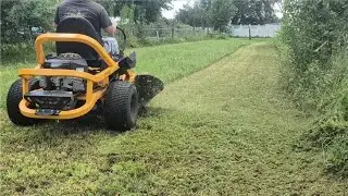 Slingin' thick/wet grass with The Cub 