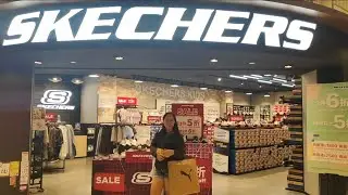 Window shopping at Sketchers store