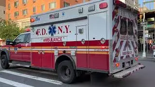 FDNY EMS AMBULANCE RESPONDING ON 3RD AVENUE IN THE HARLEM AREA OF MANHATTAN IN NEW YORK CITY.