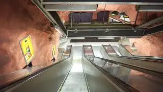 Sweden, Stockholm, R&aring;dhuset subway station, escalator ride down to platform level