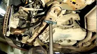 How to Install a Monroe Quick Strut Assembly 2004 Ford Taurus SES