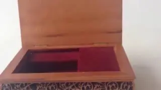Ornate wood laser cut music box jewelry rings storage