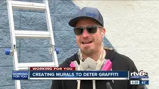 Local business owner working to stop graffiti by creating a public arts project