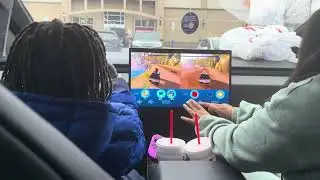 G2 and his mom playing Beach Buggy Racing 2 at the charging station 
