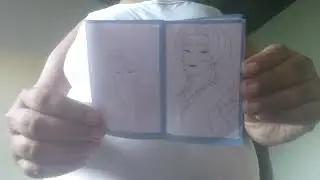 Mostrando o mini livro do saja boys 
