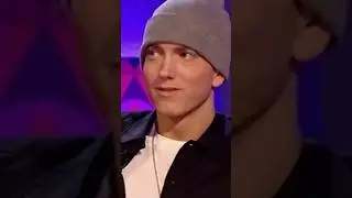 The first time we see Eminem smile