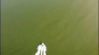 Speed boat run in Baltic sea, Liepaja beach. Drone footage.