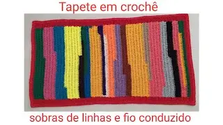 Tapete em crochê com  sobras de linhas e com fio conduzido
