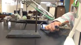 Copper (II) carbonate is heated.