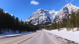 Kananaskis Trail road AB 40S - scenic winter drive. Canada. Alberta