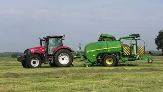 RONDE BALEN PERSEN MET EEN CASE MAXXUM 125 JOHN DEERE C441 R