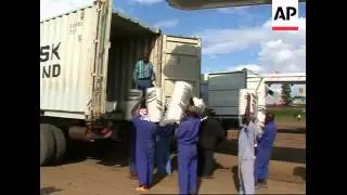 Crowds wait for food, MSF treats cholera victims, aid plane