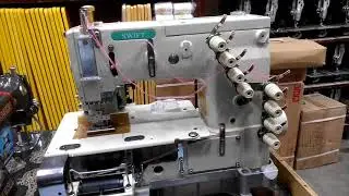 1404 PMD ELASTIC ATTACHING MACHINE