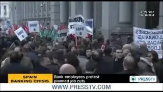 SPAIN: Bank Employees Protest Planned Job Cut