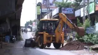 auto drivers begging for road repair in mangalore