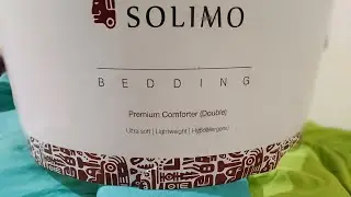 Review after 2 yrs use of  Amazon Brand- Solimo Reversible Comforter Double(Aqua Blue & Olive Green)